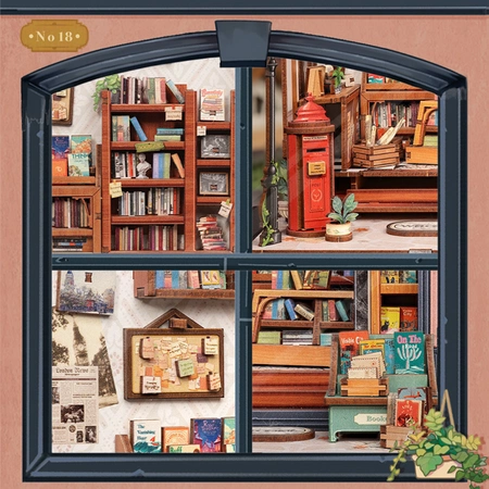 Jack’s Bookery – regały z książkami i obrazy na ścianach